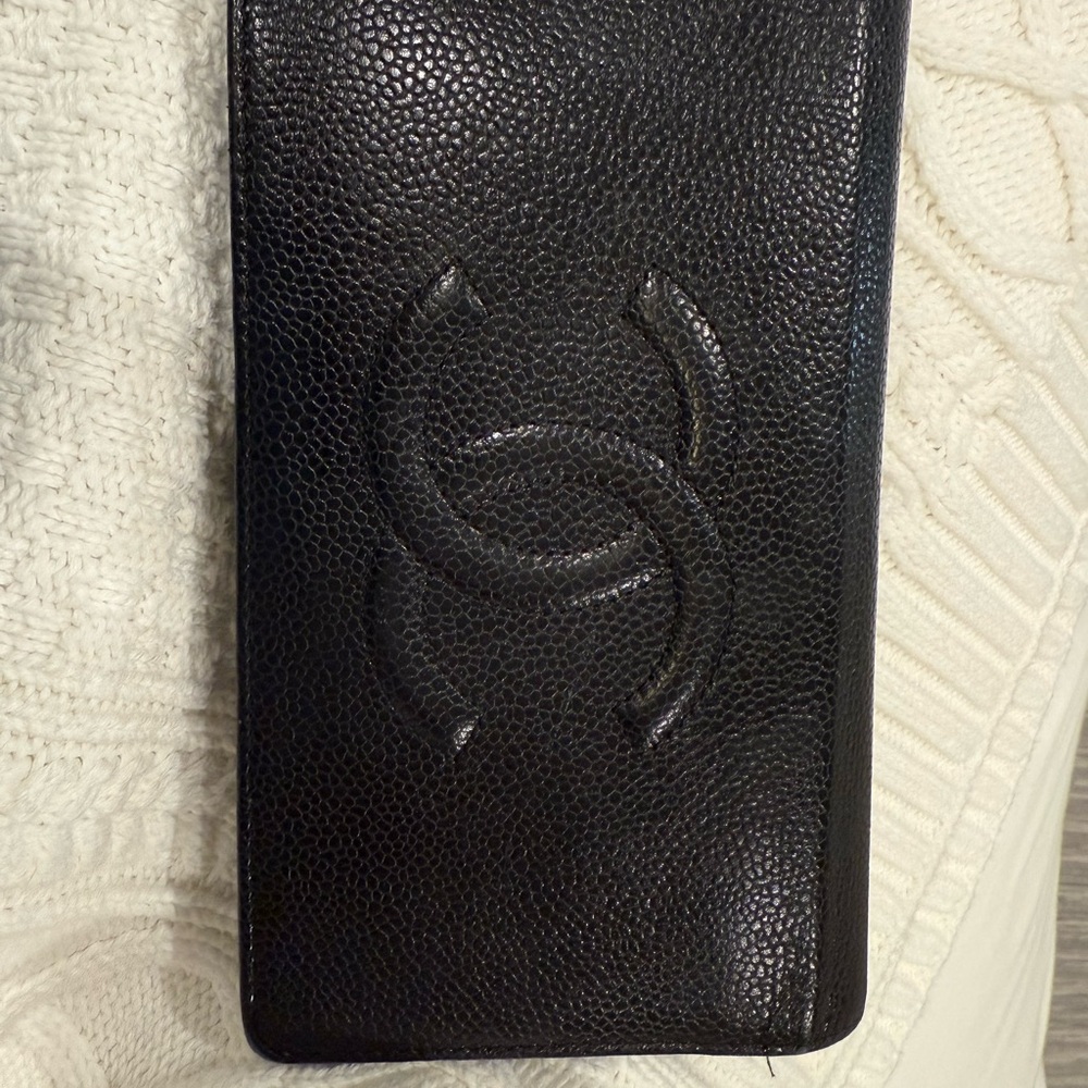 CHANEL Black Leather Wallet with Embossed Logo